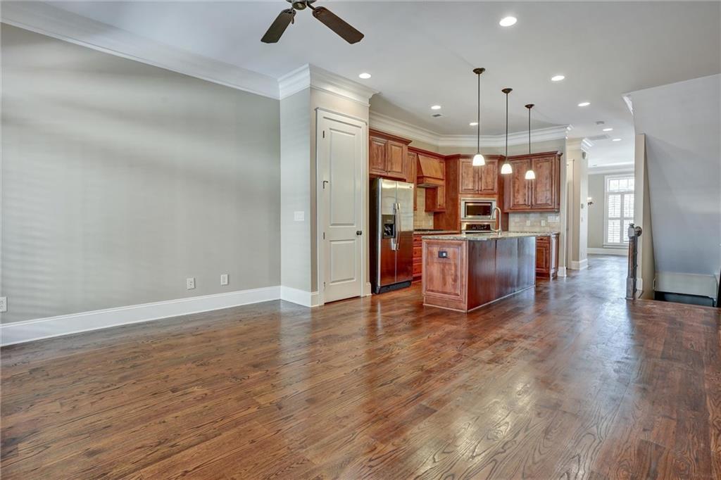 2443 Gatebury Circle Atlanta, GA 30341 - Photo 17 of 45 an open kitchen with a table and chairs in it