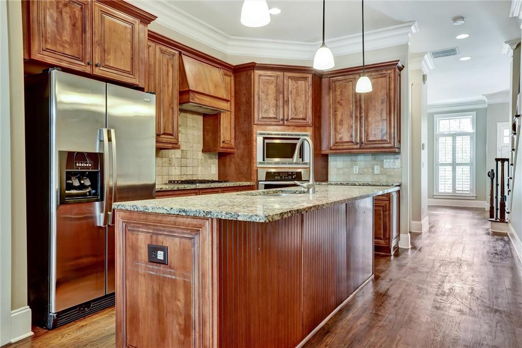2443 Gatebury Circle Atlanta, GA 30341 - Photo 19 of 45 a kitchen with stainless steel appliances granite countertop a refrigerator a oven a sink and dishwasher