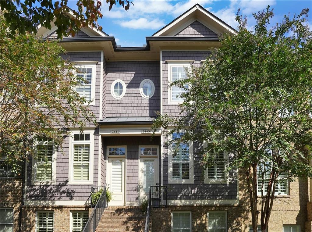 2443 Gatebury Circle Atlanta, GA 30341 - Photo 2 of 45 front view of a house with a small yard
