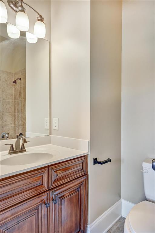 2443 Gatebury Circle Atlanta, GA 30341 - Photo 34 of 45 a bathroom with a sink and a mirror