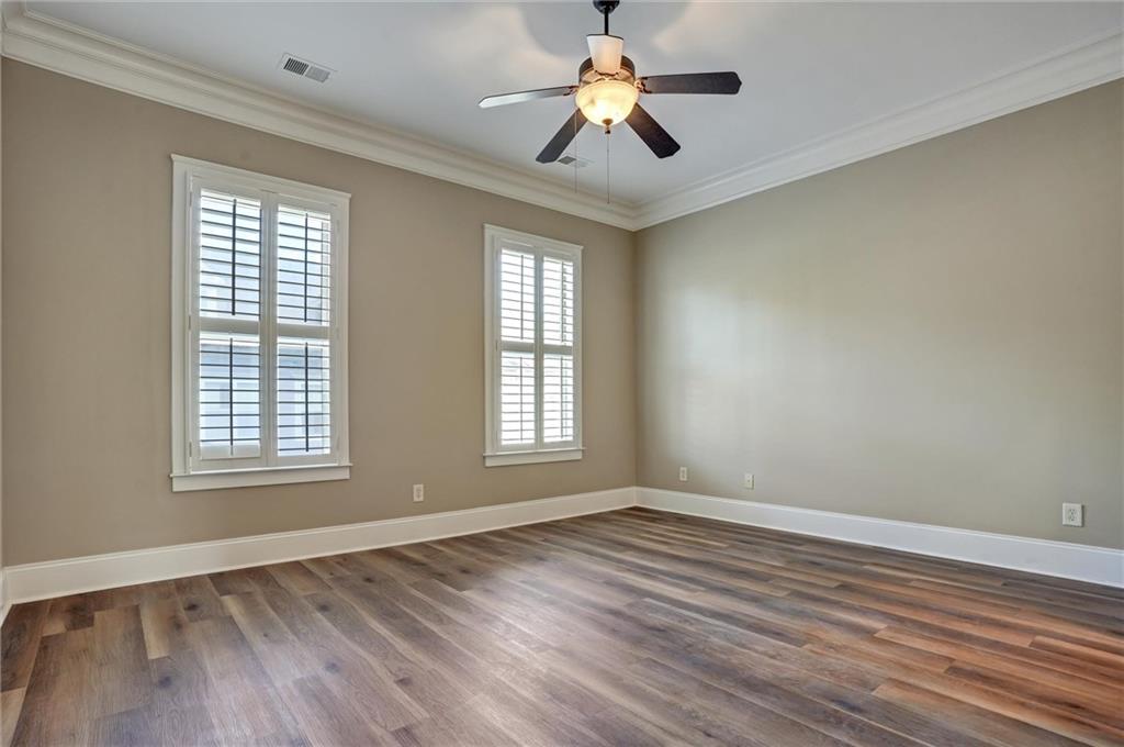 2443 Gatebury Circle Atlanta, GA 30341 - Photo 36 of 45 wooden floor in an empty room with a window