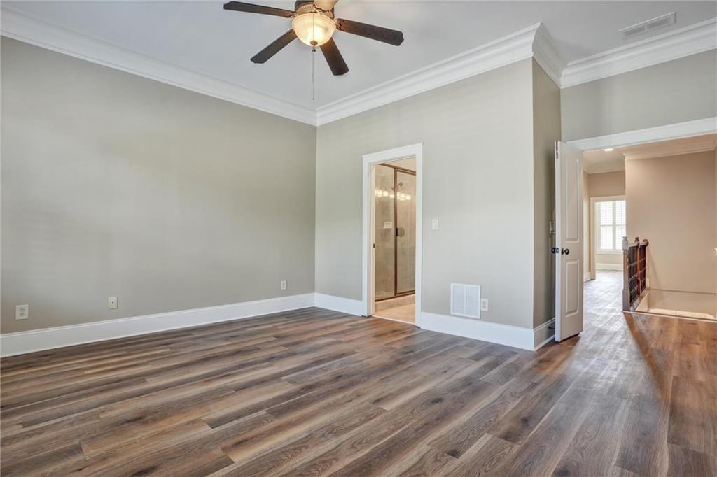 2443 Gatebury Circle Atlanta, GA 30341 - Photo 37 of 45 a view of empty room with wooden floor