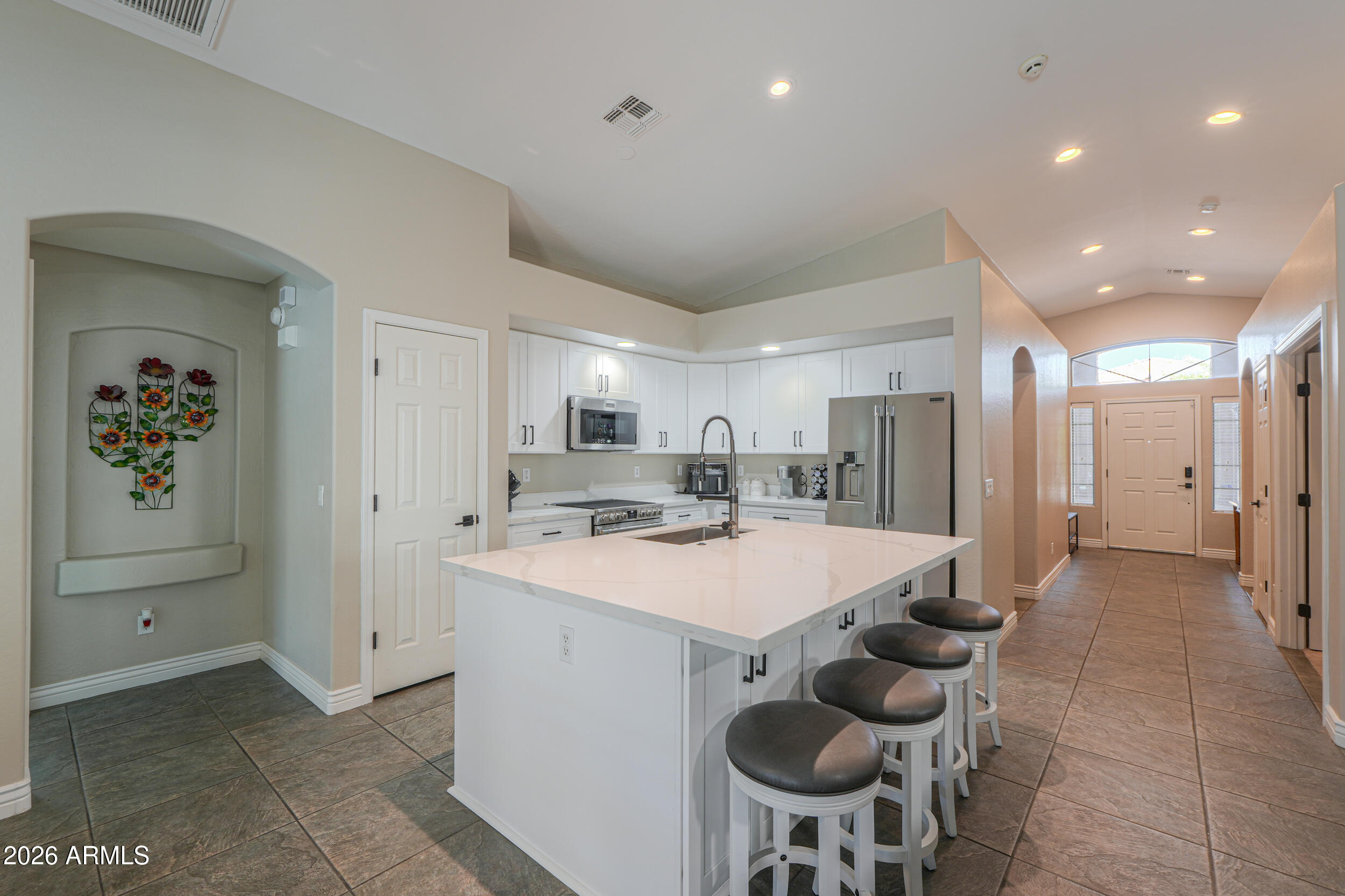 43843 Roth Road Maricopa, AZ 85138 - Photo 23 of 53 a large kitchen with a table and chairs