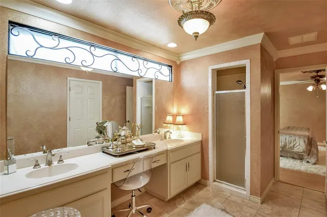 a bathroom with a sink and mirror