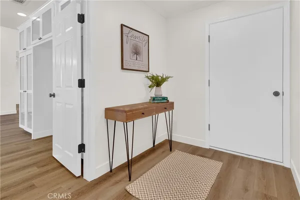 a view of a dining room with furniture and window