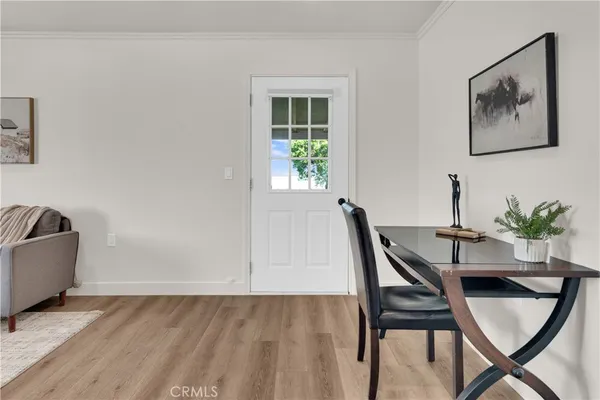a living room with furniture and a rug