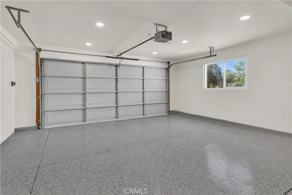 a view of a patio with a table chairs and a table