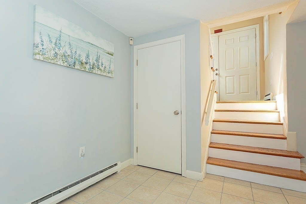 130 Worthen Road Lexington, MA 02421 - Photo 17 of 27 a view of an entryway with stairs