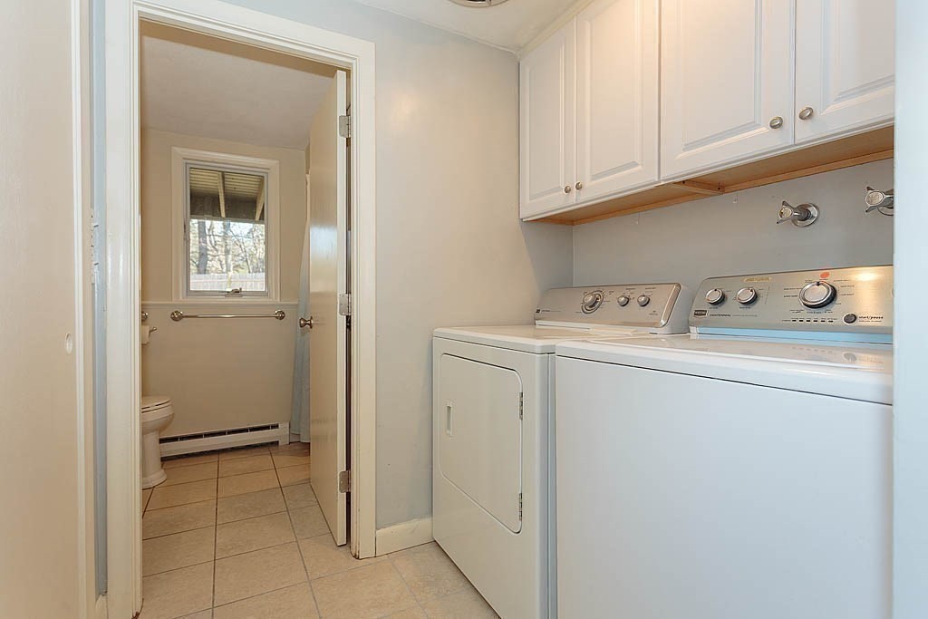 130 Worthen Road Lexington, MA 02421 - Photo 22 of 27 a utility room with dryer and washer