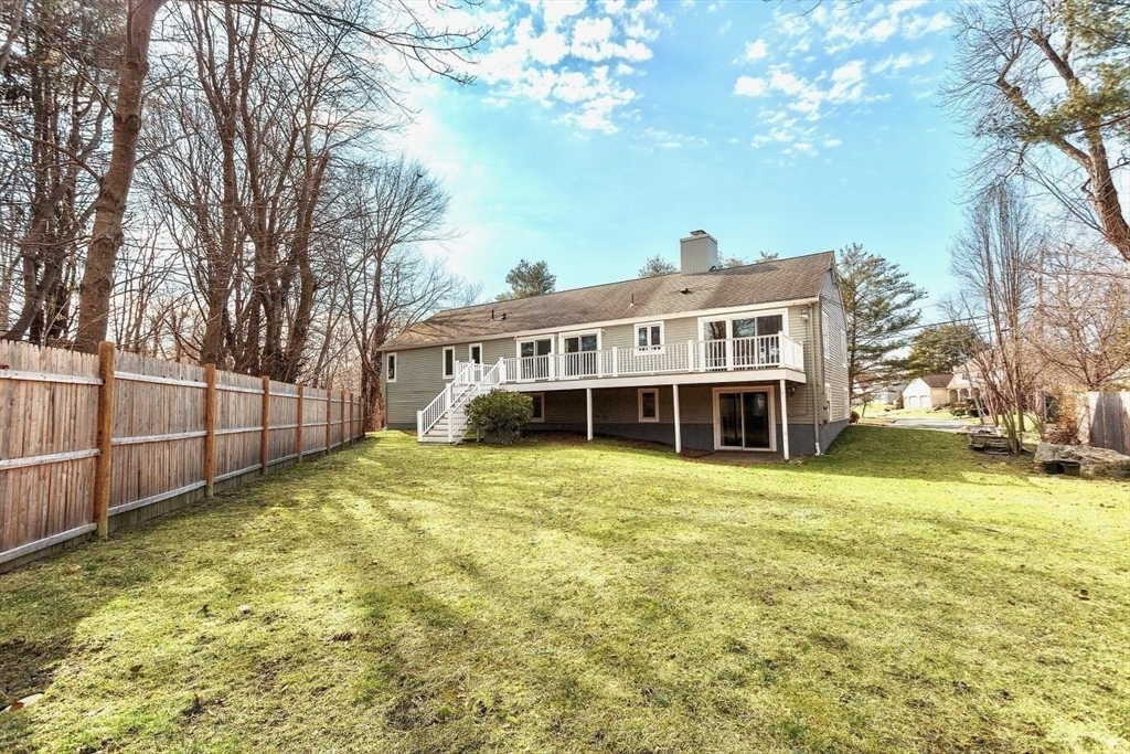 130 Worthen Road Lexington, MA 02421 - Photo 25 of 27 a view of a house with a yard