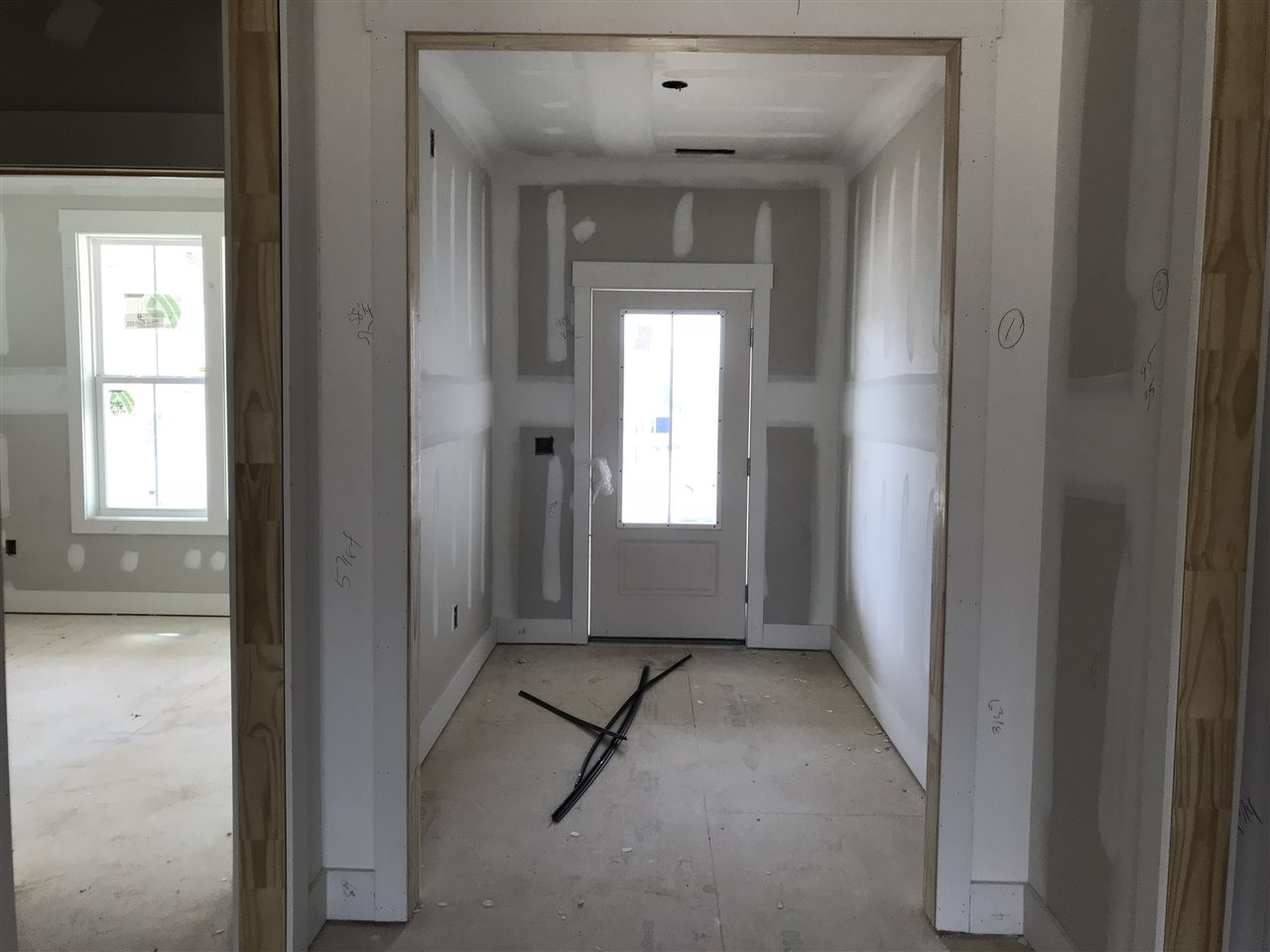 429 Slick Rock Road Wendell, NC 27591 - Photo 7 of 19 Wide foyer gives definition to the space without feeling cramped.