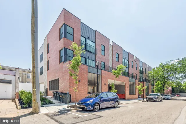 a car parked in front of a building