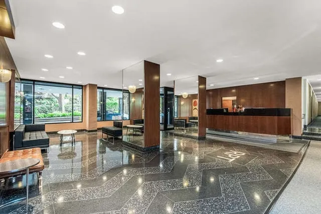 a view of living room and kitchen with furniture