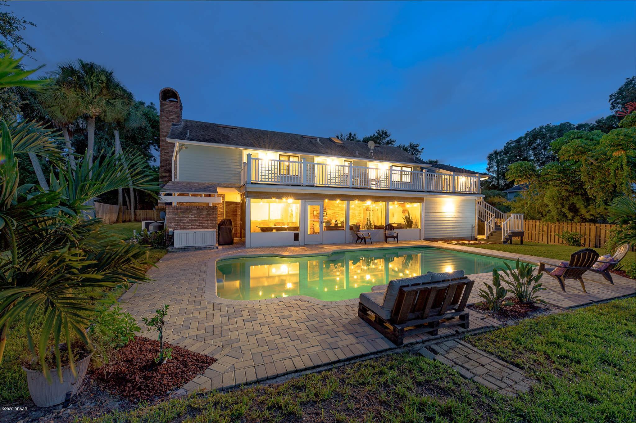 35 Neptune Avenue Ormond Beach, FL 32176 - Photo 15 of 58 a view of a house with a yard