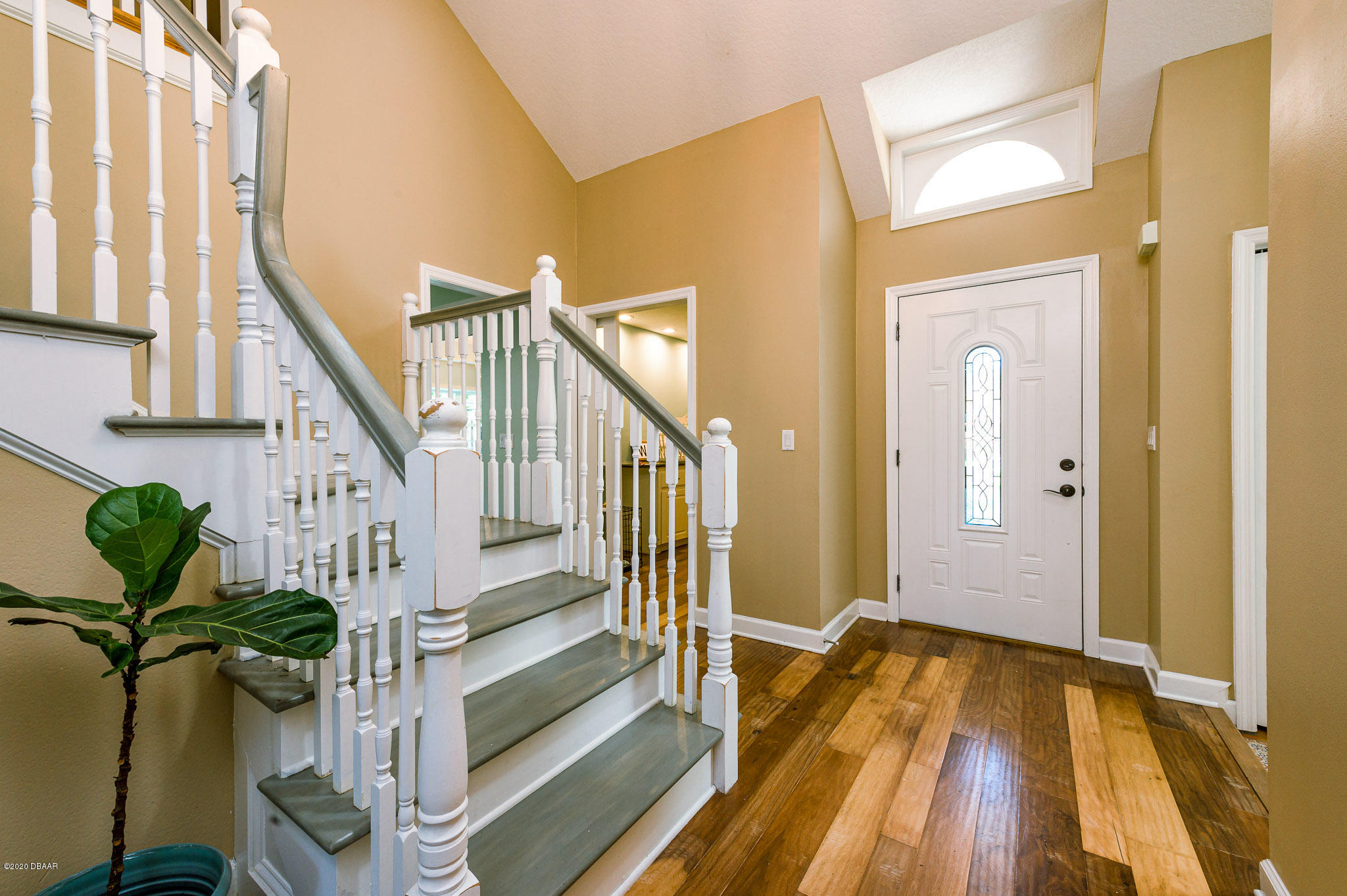 35 Neptune Avenue Ormond Beach, FL 32176 - Photo 19 of 58 a view of entryway and hall with wooden floor