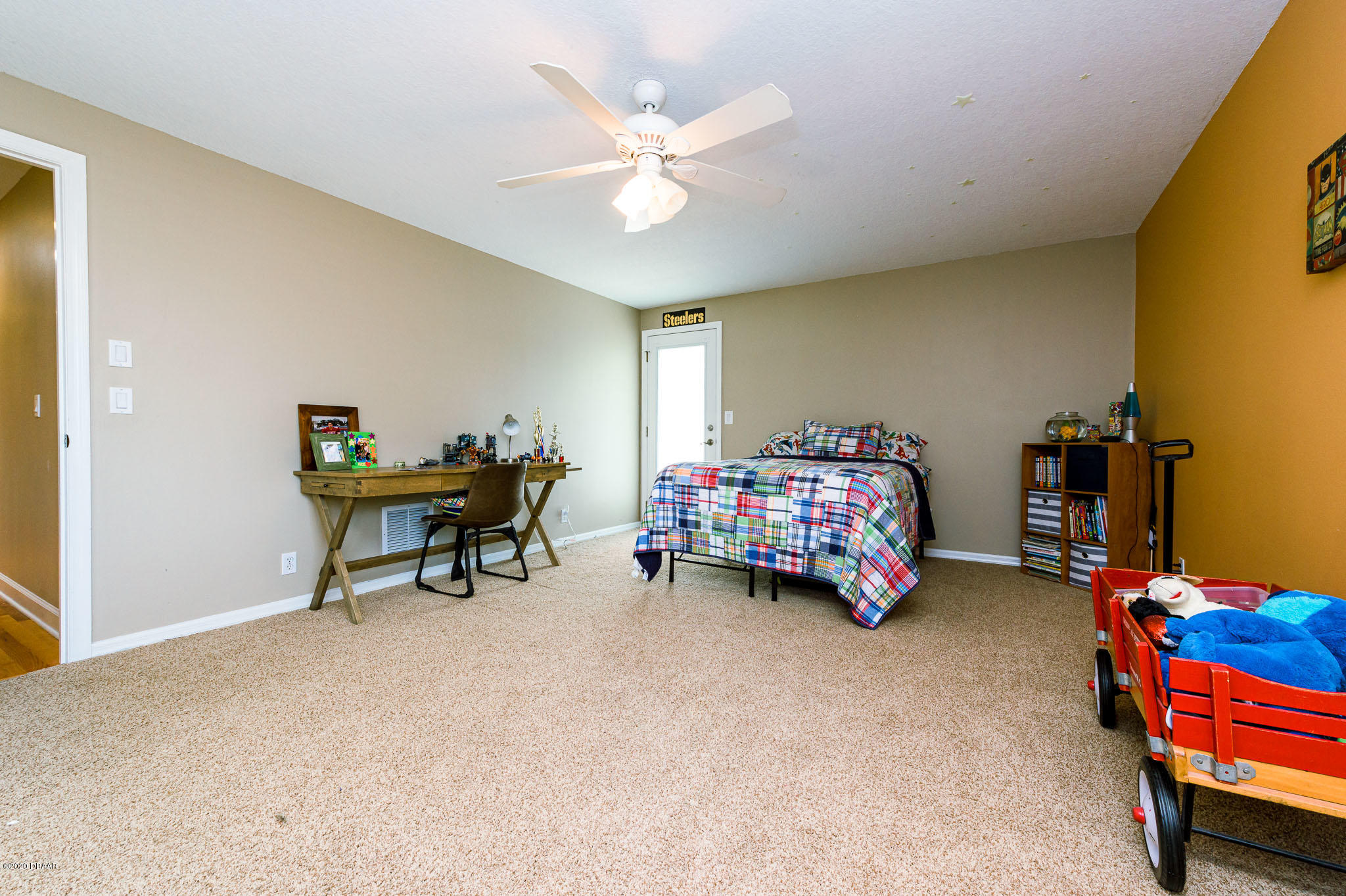 35 Neptune Avenue Ormond Beach, FL 32176 - Photo 54 of 58 a bedroom with furniture and a fan