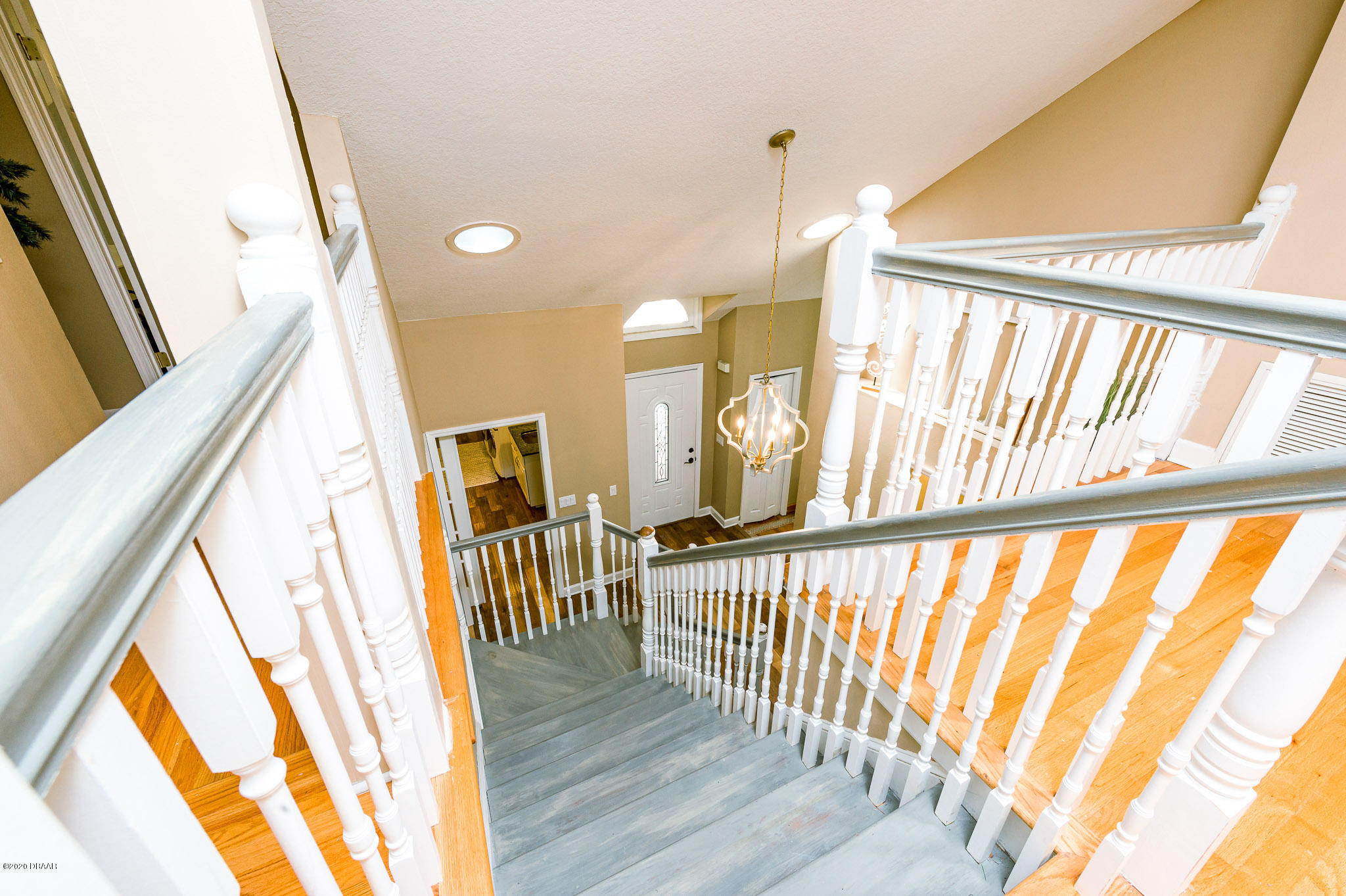 35 Neptune Avenue Ormond Beach, FL 32176 - Photo 57 of 58 a view of an entryway with wooden floor