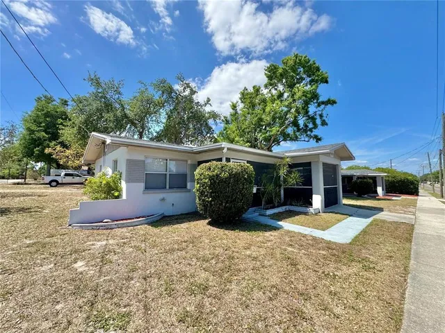 front view of a house with a patio