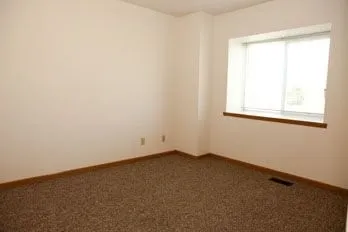 an empty room with a window