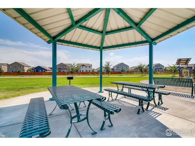 a view of outdoor space with garden and lots of trees
