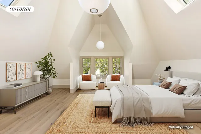 a bathroom with a double vanity sink toilet and shower