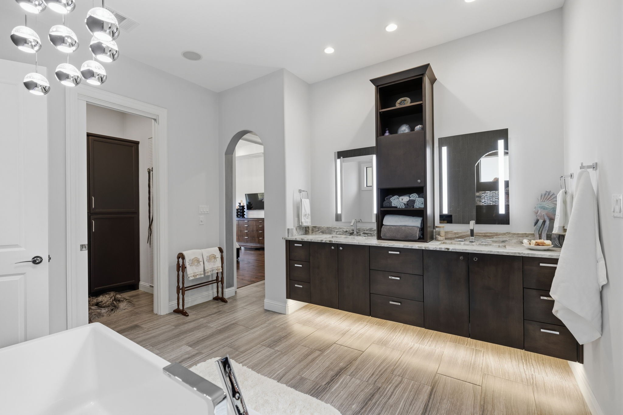6918 Comanche Bend Montgomery, TX 77316 - Photo 38 of 50 Primary retreat at its finest! This is the perfect home to enjoy a staycation lifestyle, paired with a community designed for resort-style living, peaceful surroundings, and everyday luxury.