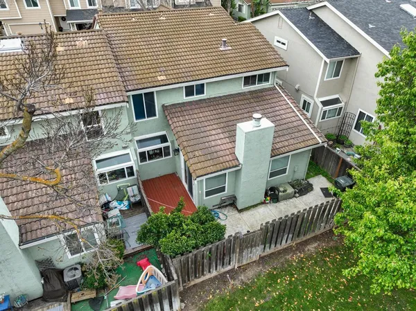 an aerial view of a house with a garden