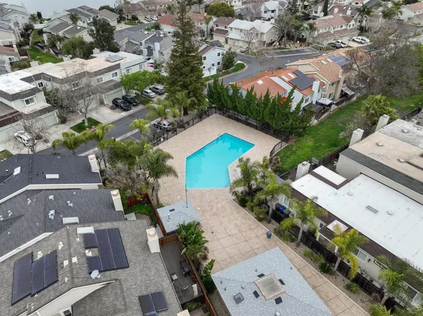 an aerial view of a house with a garden
