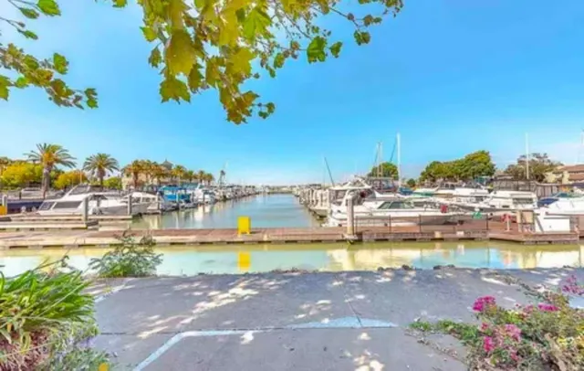 a view of a swimming pool with an outdoor space and seating area