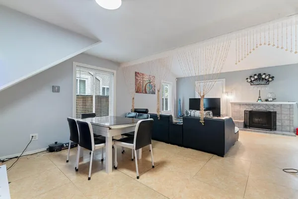 a view of a livingroom with furniture and a fireplace