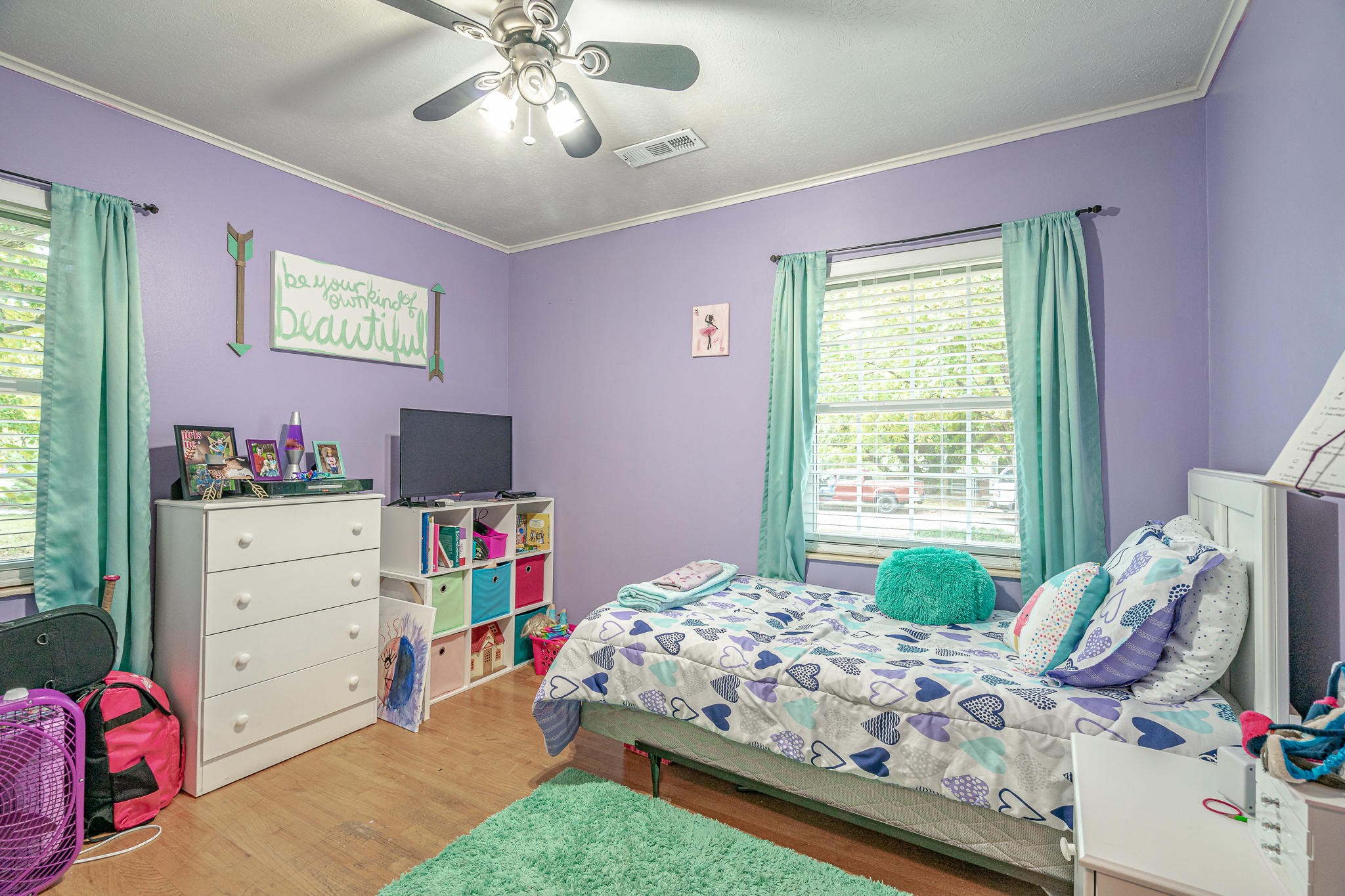22 Lindale Lane Oak Ridge, TN 37830 - Photo 16 of 26 a bedroom with a bed and a dresser in it