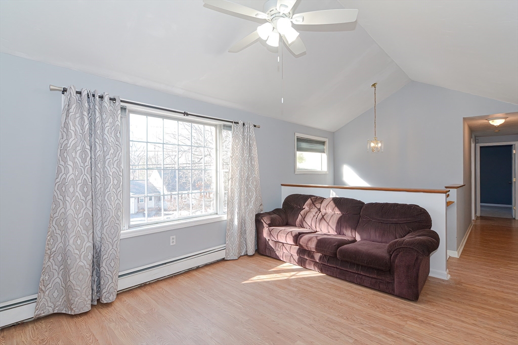 38 Clark Road Sturbridge, MA 01518 - Photo 12 of 30 a living room with furniture and a window