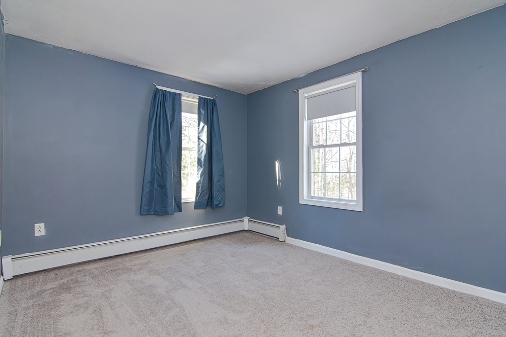 38 Clark Road Sturbridge, MA 01518 - Photo 13 of 30 an empty room with a window