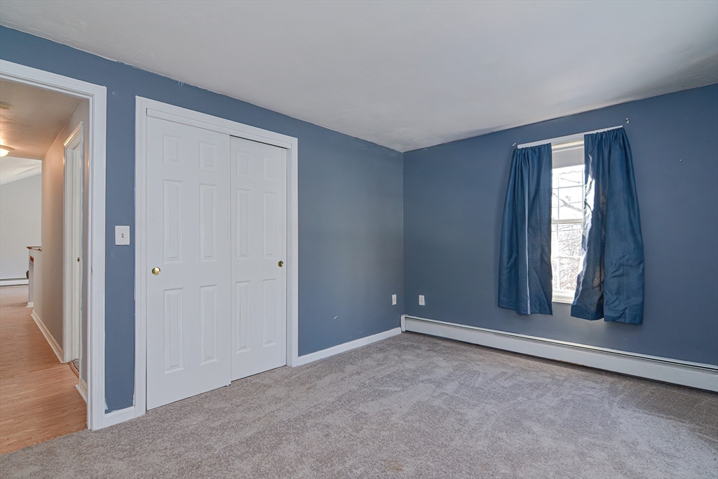 38 Clark Road Sturbridge, MA 01518 - Photo 14 of 30 an empty room with windows and closet