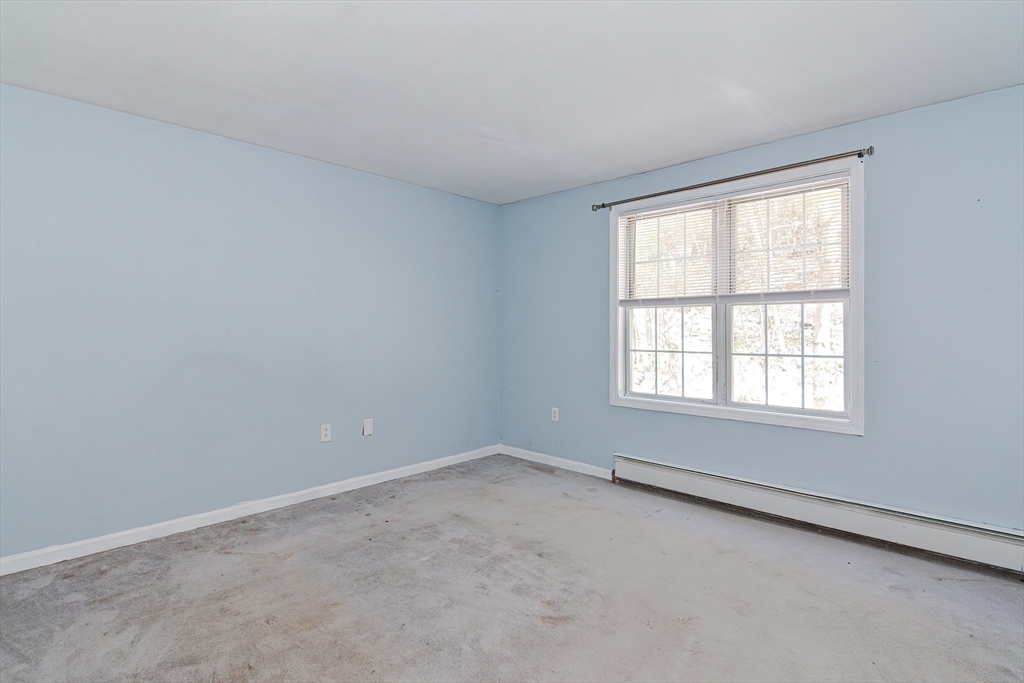 38 Clark Road Sturbridge, MA 01518 - Photo 15 of 30 an empty room with a window