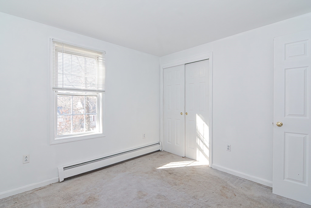 38 Clark Road Sturbridge, MA 01518 - Photo 17 of 30 an empty room with windows
