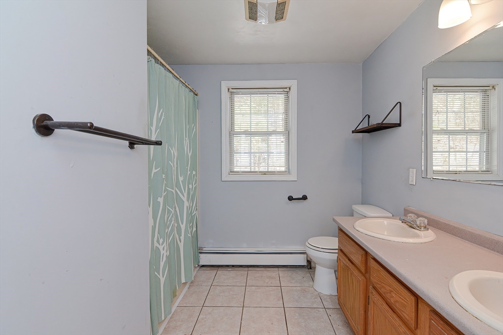 38 Clark Road Sturbridge, MA 01518 - Photo 19 of 30 a bathroom with a sink toilet and shower