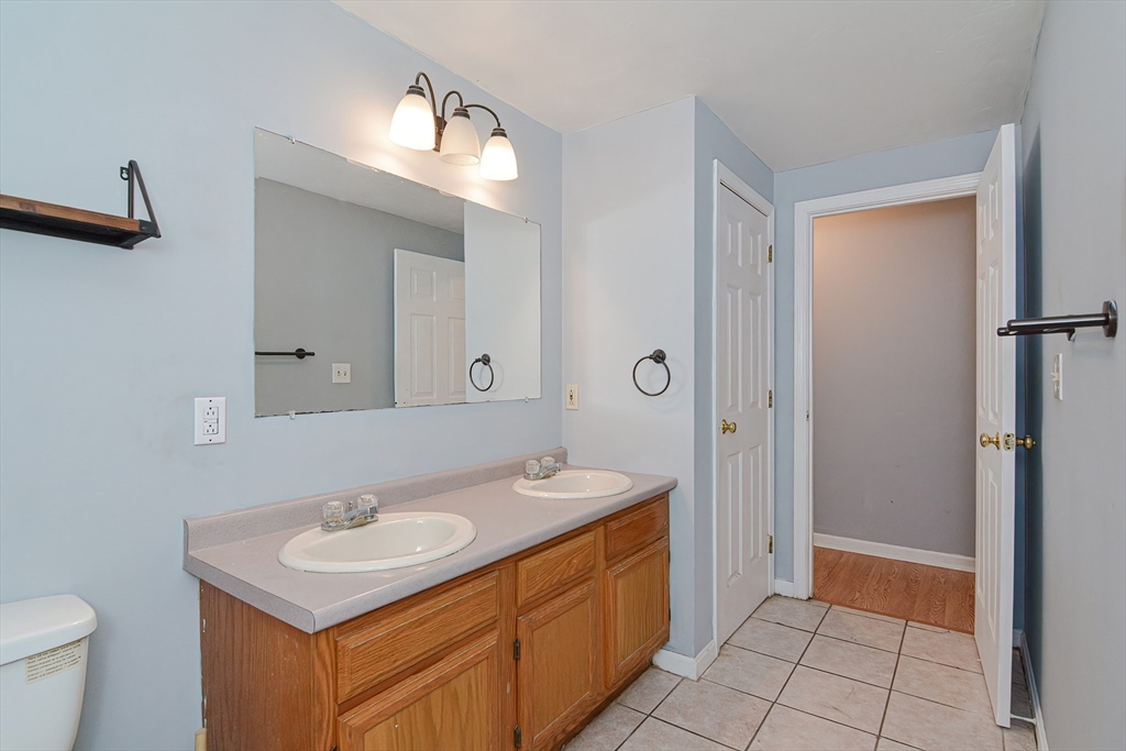 38 Clark Road Sturbridge, MA 01518 - Photo 20 of 30 a bathroom with a sink toilet and a mirror