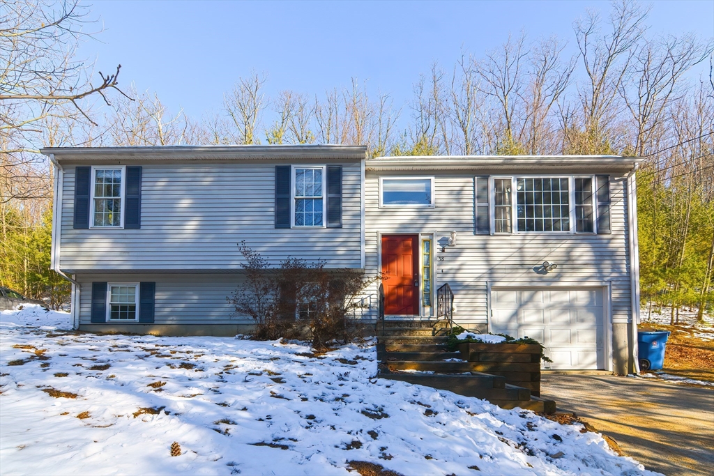 38 Clark Road Sturbridge, MA 01518 - Photo 2 of 30 a front view of a house with a yard