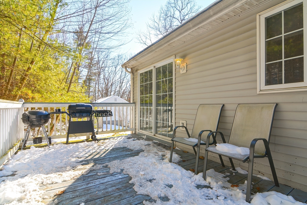 38 Clark Road Sturbridge, MA 01518 - Photo 28 of 30 a view of a chairs and table in backyard of the house