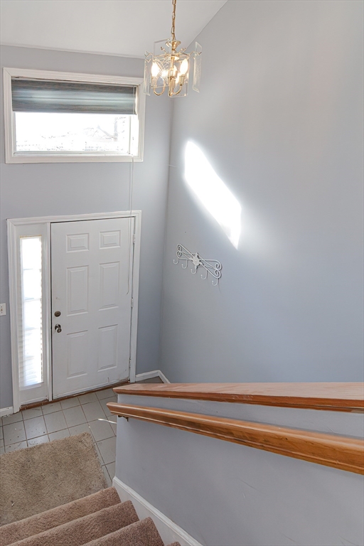 38 Clark Road Sturbridge, MA 01518 - Photo 5 of 30 a view of a livingroom with a chandelier