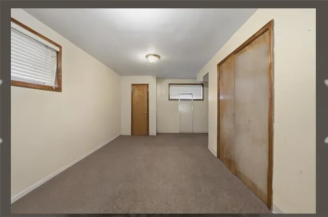 a view of a hallway with closet