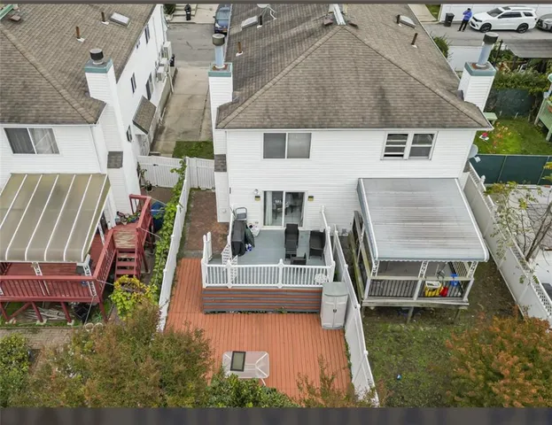 an aerial view of a house with swimming pool