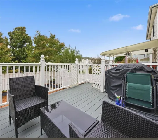 a view of a roof deck with couches