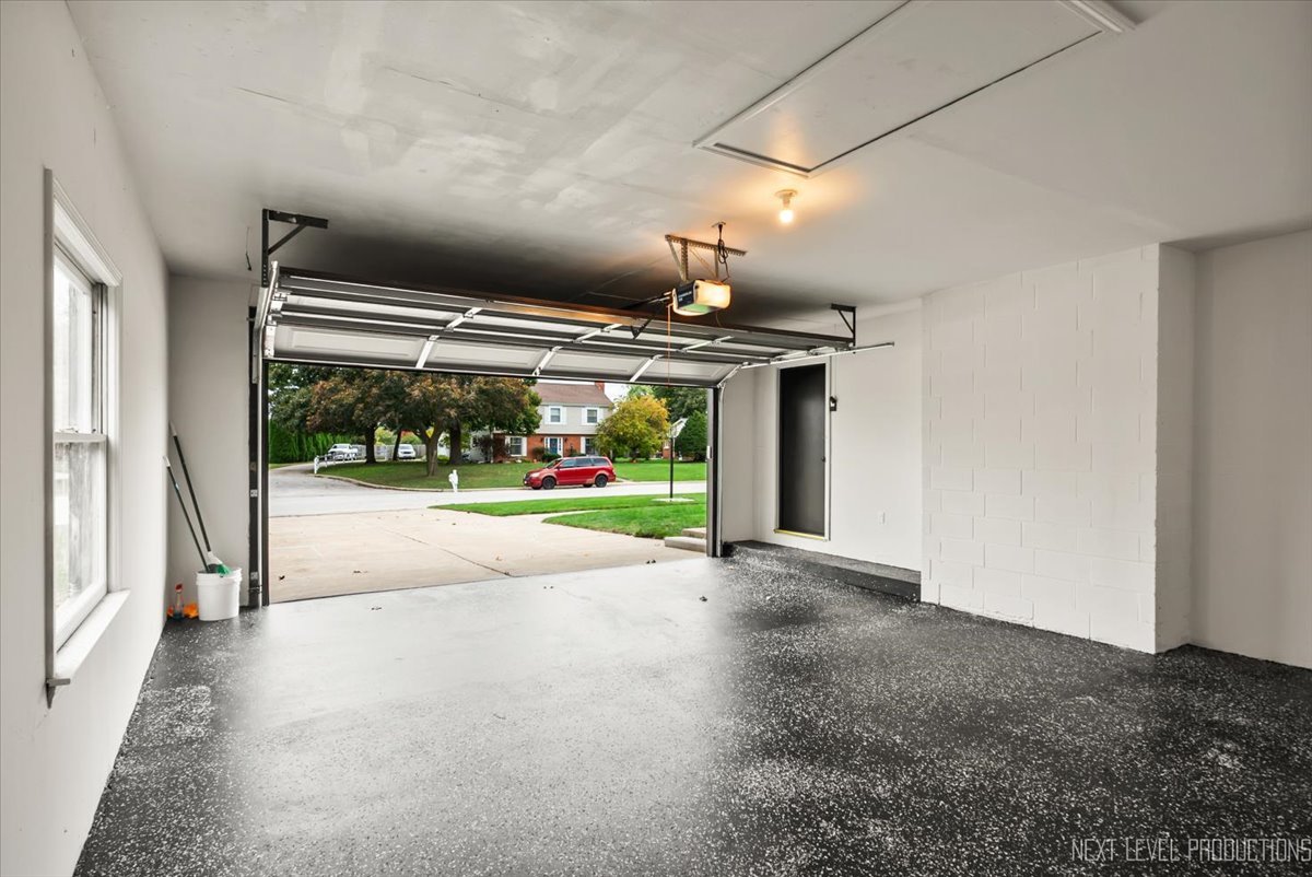 27 South Canterbury Road Aurora, IL 60506 - Photo 27 of 39 a view of garage with large window