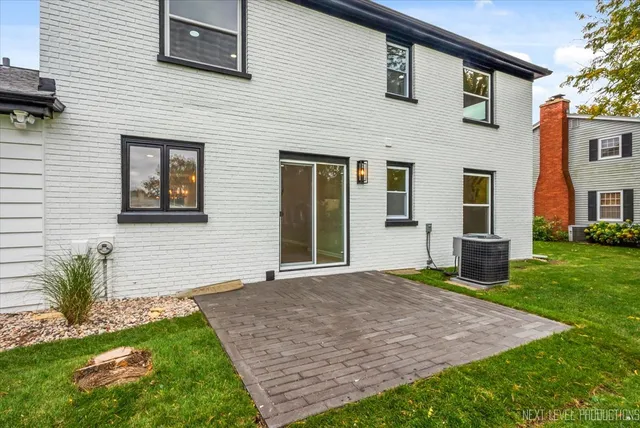 a front view of house with yard