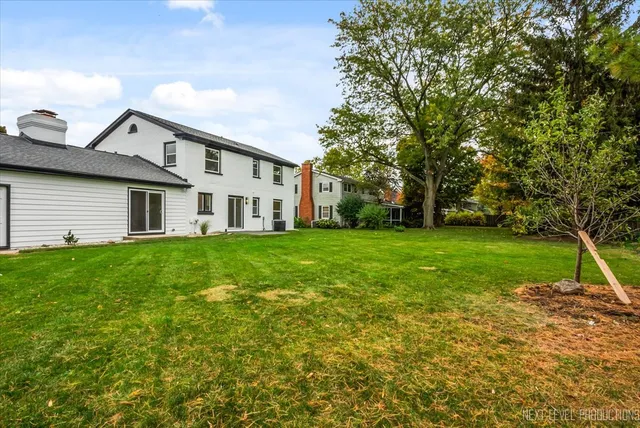 a view of a backyard with a garden