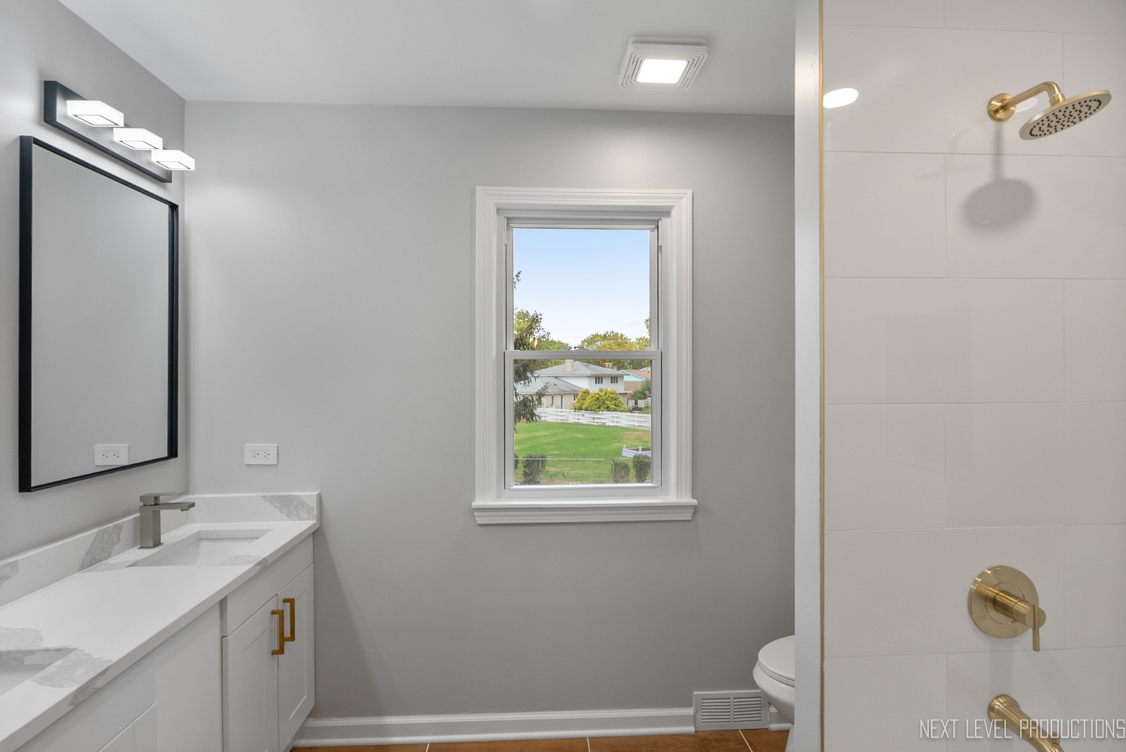 27 South Canterbury Road Aurora, IL 60506 - Photo 7 of 39 a bathroom with a granite countertop sink toilet and mirror