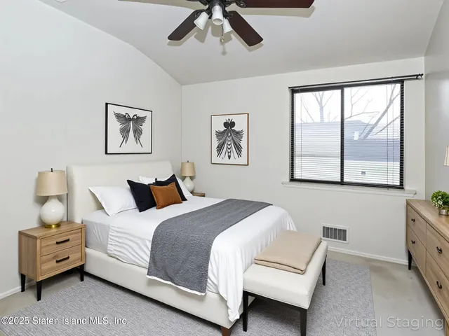 a view of balcony with wooden floor and fence