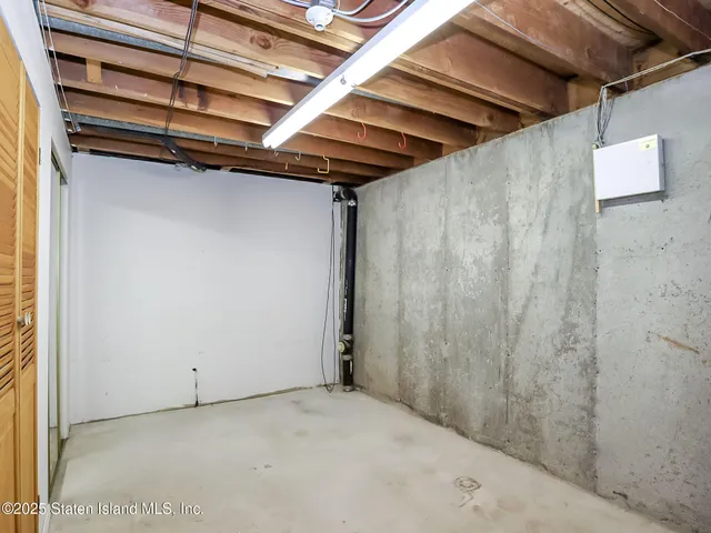 a view of a park with large trees